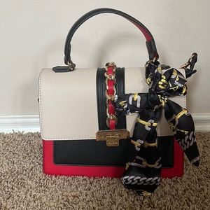 Red, black and cream shoulder bag